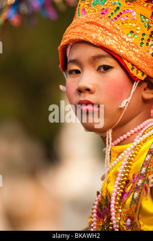 Young boy of the Shan people from Burma about to become a novice monk during a ceremony in Chiang Mai, Thailand. Stock Photo