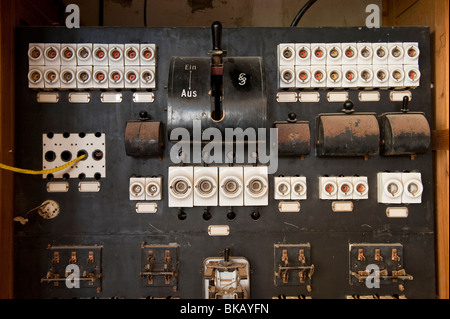 Backstage lighting control panel in the Theatre & Ballroom, Kolmanskop Ghost Town near Luderitz, Namibia Stock Photo