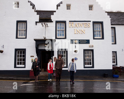 People Leaving the Hawes Inn, South Queensferry, Scotland Stock Photo