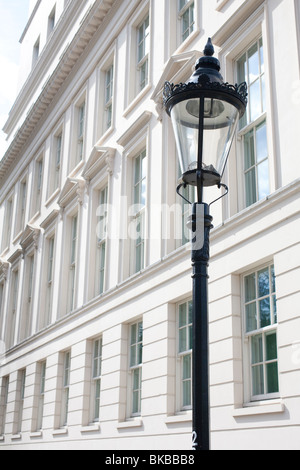 Lamp post and Georgian windows. Rutland Gate, Knightsbridge, London, England, UK Stock Photo