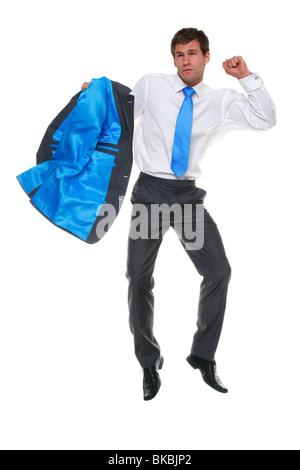 Photo of a businessman jumping in the air holding his suit jacket, isolated on a white background Stock Photo