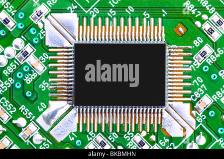 Close up of a computer chip on a circuit board Stock Photo