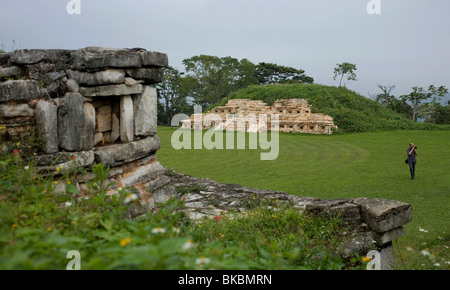 A photographer takes pictures in the central patio of the Totonacan ruins in Yohualichan, Cuetzalan del Progreso, Mexico Stock Photo