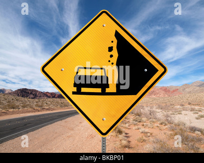 Falling Rock warning sign on lonely Nevada highway. Stock Photo