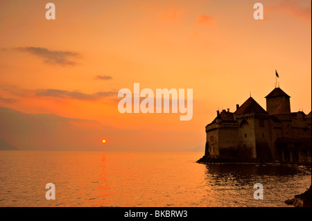 The Chateau de Chillon, on Lac Leman (Lake Geneva) at sunset Stock Photo