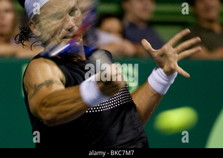 Spanish tennis player Carlos Moya hitting a drive shot Stock Photo