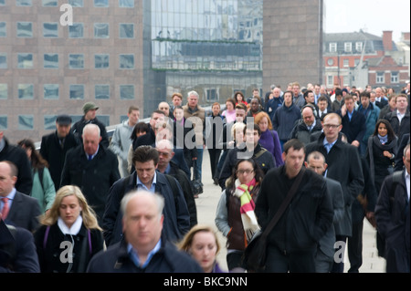 Commuters surging across London Bridge in the morning rush hour, 8am, April 2010, UK Stock Photo