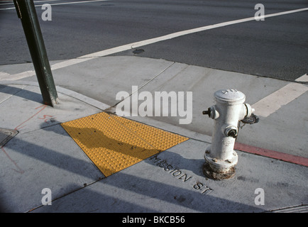 sidewalk disabled ramp at intersection corner Stock Photo - Alamy