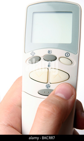 Remote control in a man hand. Isolated on white background. Stock Photo