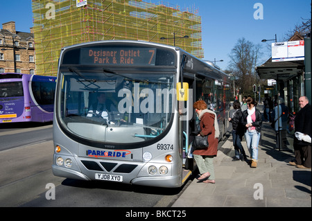 Park and ride bus at a bus stop in a city centre in England Stock Photo