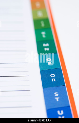 Alphabetical page index tabs in an address note book Stock Photo