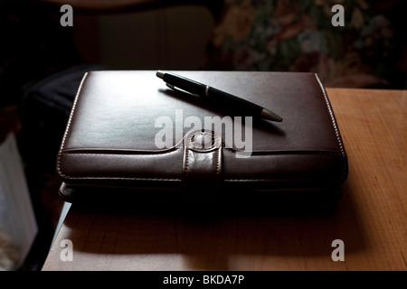 A diary address book day planner leather bound with a snap closure Stock Photo