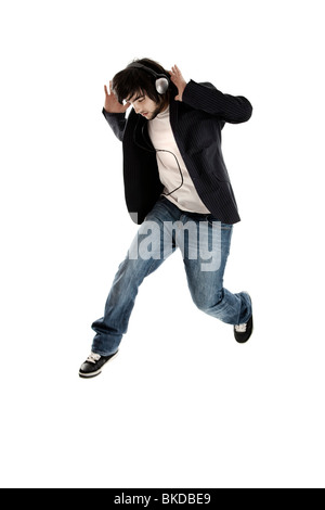 Young modern man jumping over a white background Stock Photo