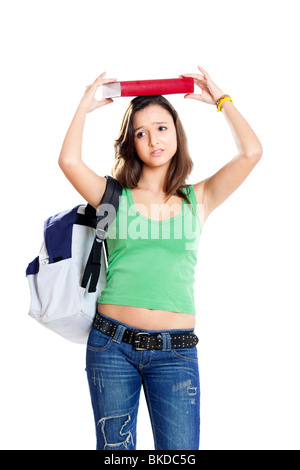 Beautiful young female student worried before an exam, isolated on white Stock Photo