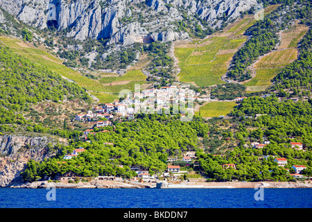 Small town in Croatia situated on hillside overlooking Adriatic Sea Stock Photo