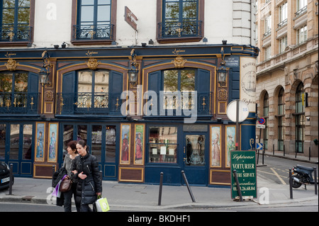 Paris, France, Classical French Restaurant Façade In Latin Quarter,  Outside 'Lapérouse' Women walking old French storefront, vintage Paris window Stock Photo