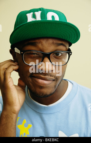 African American man in baseball cap and eyeglasses Stock Photo