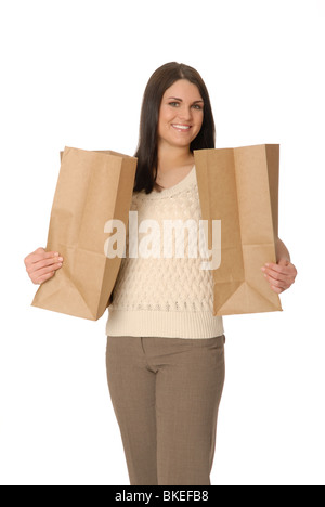 Attractive woman with two brown paper shopping bags. Stock Photo