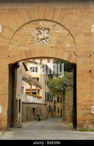 Porta San Giorgio, St, George's Gate, built in 1260, is the oldest surviving gate in Florence. On the facade of the gate is a .. Stock Photo