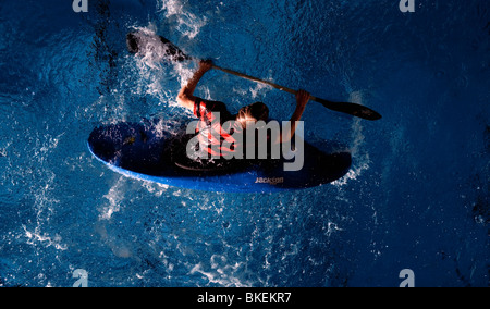 Freestyle Whitewater Kayaker capsizing, Ulm, Baden-Wuerttemberg, Germany Stock Photo