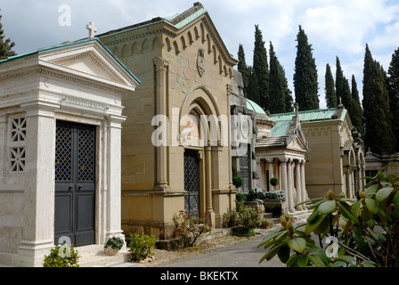 The cemetery surrounding the Basilica of San Miniato al Monte opened 1854. The cemetery contains family tombs, the size of .... Stock Photo