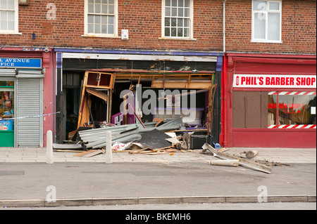 Sunbed shop front smashed after lorry crashed into it Stock Photo
