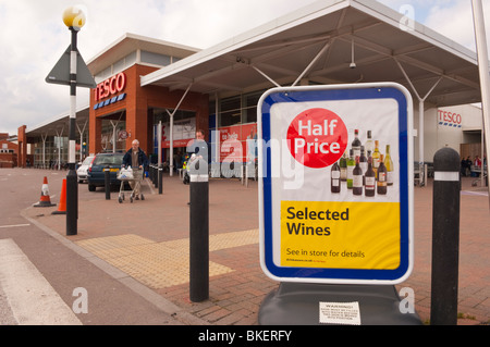 A sign advertising half price wines at the Tesco Superstore in Beccles , Suffolk , England , Great Britain , UK Stock Photo