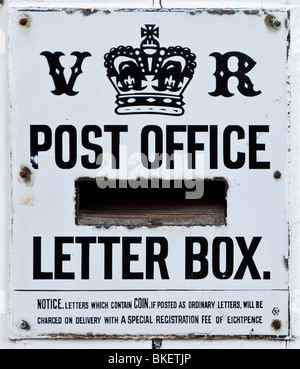 Old Victorian Post Office Letter Box and Sign Stock Photo