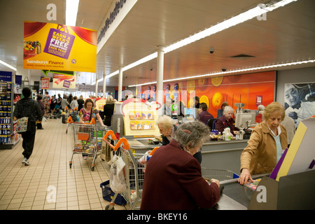 People shopping in Sainsburys supermarket London, UK Stock Photo