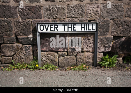 A road sign for 'Over The Hill' at Biddulph Moor, near Stoke-upon-Trent, Staffordshire. Stock Photo