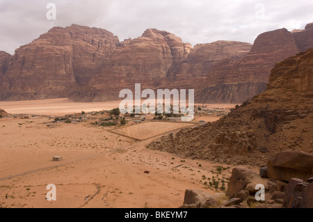 Rum Village in the desert of Wadi Rum surrounded by giant rock formations. Jordan Stock Photo