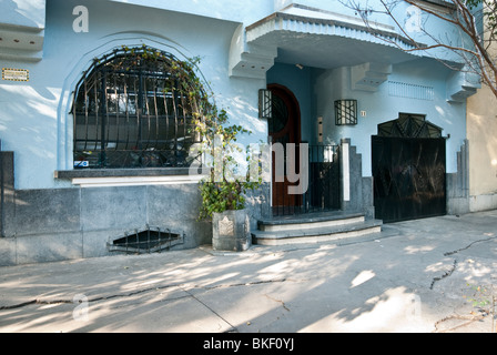 ground floor facade of beautifully detailed blue stucco Art Deco house in Condesa District Mexico City Stock Photo