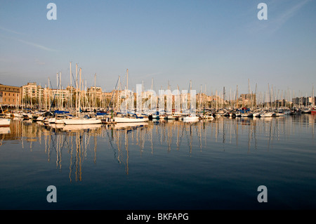 port vell in barcleona with docked boats in the evening Stock Photo