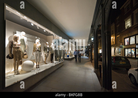 The Zara store at night on Eastgate, one of The Rows in the historic centre of Chester, Cheshire, England, UK Stock Photo