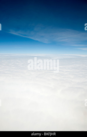 typical views you see when flying above the clouds in a aeroplane maybe on holiday or going on a business trip Stock Photo