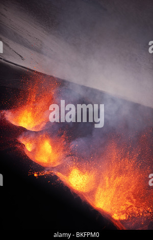 Lava fountains during volcano eruption at Fimmvorduhals, a ridge between Eyjafjallajokull glacier, and Myrdalsjokull, Iceland Stock Photo