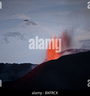 Lava fountains during volcano eruption at Fimmvorduhals, a ridge between Eyjafjallajokull glacier, and Myrdalsjokull, Iceland Stock Photo