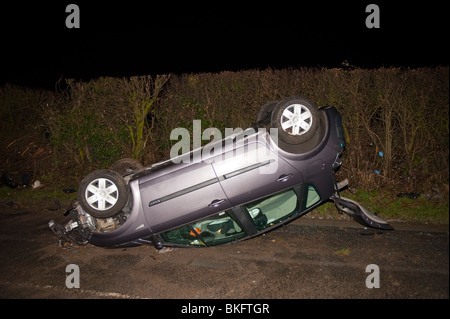 Car crashed on roof Elderly Old Driver Stock Photo