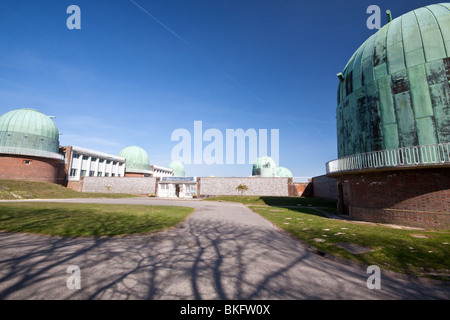 Domes at Herstmonceux Observatory, formerly part of the Royal Greenwich Observatory Stock Photo