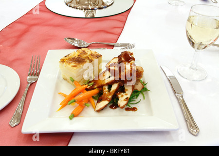 chicken dish, chicken, layered potato, carrots Wedding breakfast table Rufford wedding facilities, Rufford Mill Stock Photo