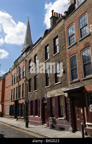 Spitalfields London Uk. Georgian town houses. 'Wilkes Street'  London EC1. Spitalfields Christ Church spire in background. HOMER SYKES Stock Photo