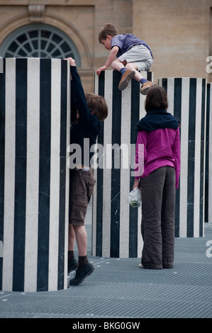 Palais Royale Gardens, Jardins, Children Playing in Park, Colonnes de  Buren Modern Sculpture Installation, Paris, France Stock Photo