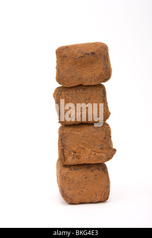 Tower of Champagne Truffles isolated against white background. Stock Photo