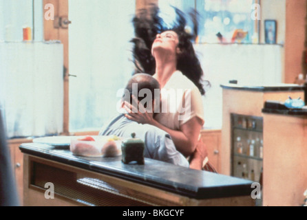 THE HAIRDRESSER'S HUSBAND (1990) JEAN ROCHEFORT, ANNA GALIENA HHU 008 Stock Photo