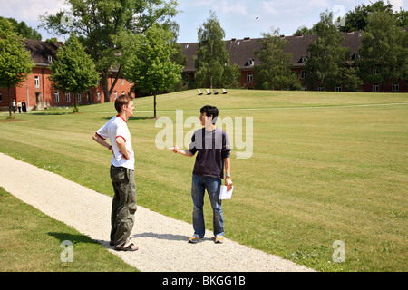Two students on the Jacobs University campus, Bremen, Germany Stock Photo