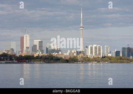 overcast day toronto cn towner downtown lake cross financial district water sky smog pollution Stock Photo