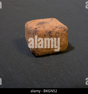 Luxury fair trade Champagne chocolate Truffles, dusted in cocoa powder. Stock Photo