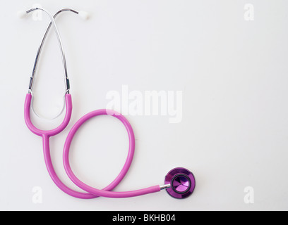 great image of pink stethoscope on white Stock Photo