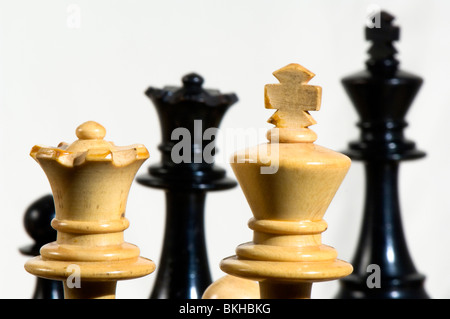 Chess. Royal pairings. White king and queen face black king and queen Stock Photo