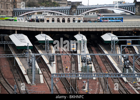 A view of the west entrance of Edinburgh's Waverly train station with tracks leading in to the platforms. Stock Photo